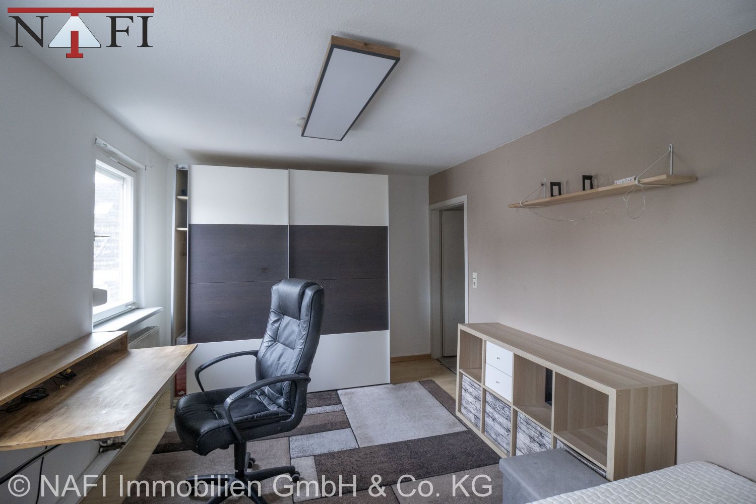 10% Renditestarkes Wohn- und Geschäftshaus in zentraler Ortskernlage mit Entwicklungspotenzial - 2. Zimmer 1. Ebene Maisonettewohnung (2. OG) (21676)