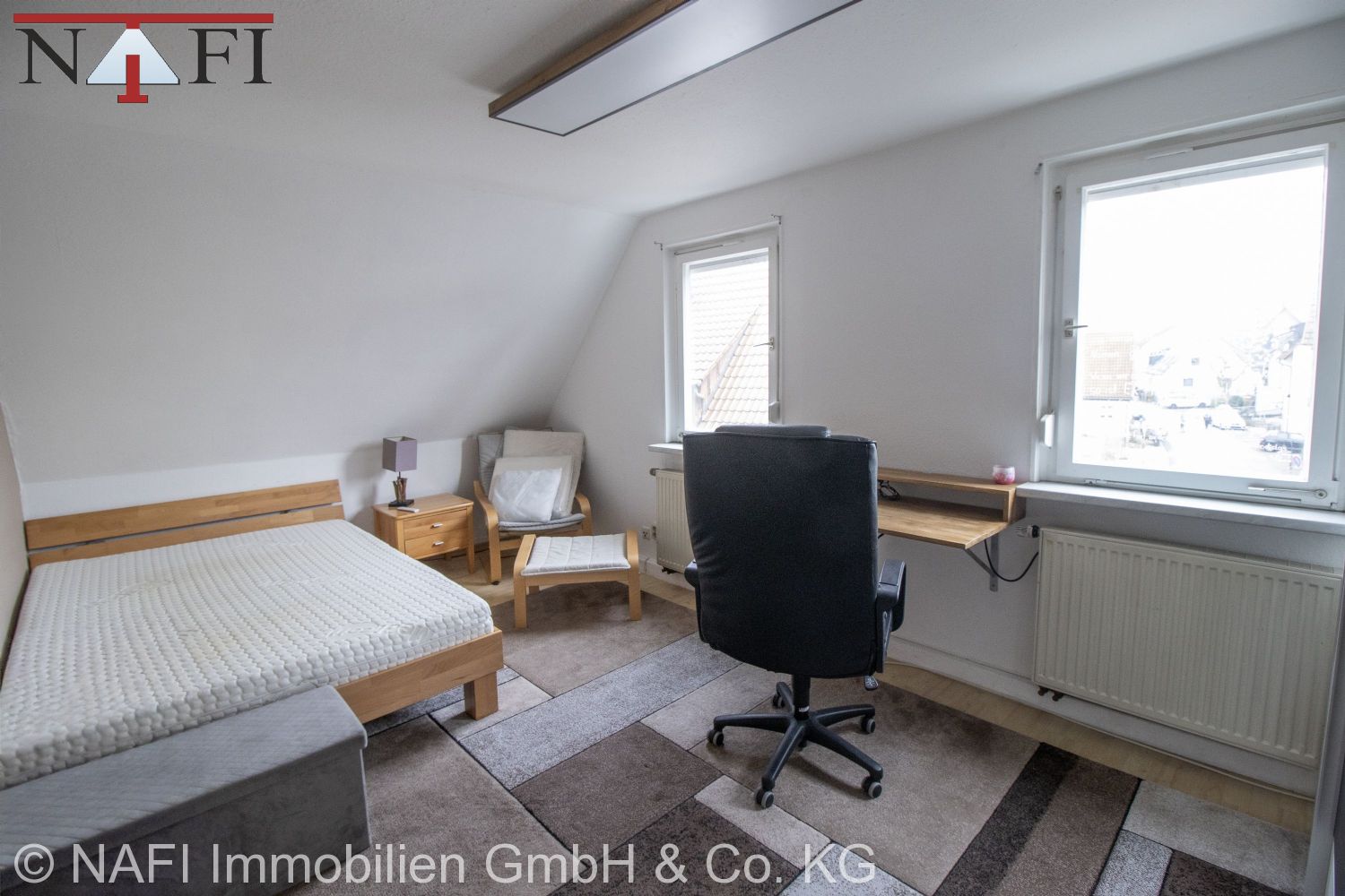 10% Renditestarkes Wohn- und Geschäftshaus in zentraler Ortskernlage mit Entwicklungspotenzial - 2. Zimmer 1. Ebene Maisonettewohnung (2. OG) (21677)