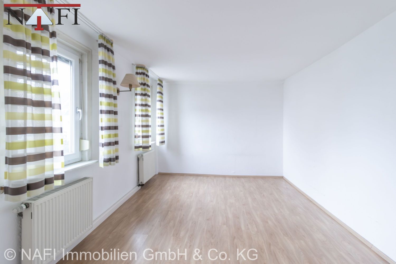 10% Renditestarkes Wohn- und Geschäftshaus in zentraler Ortskernlage mit Entwicklungspotenzial - 2. Zimmer (2-Zimmer-Whg. 1. OG) (21660)