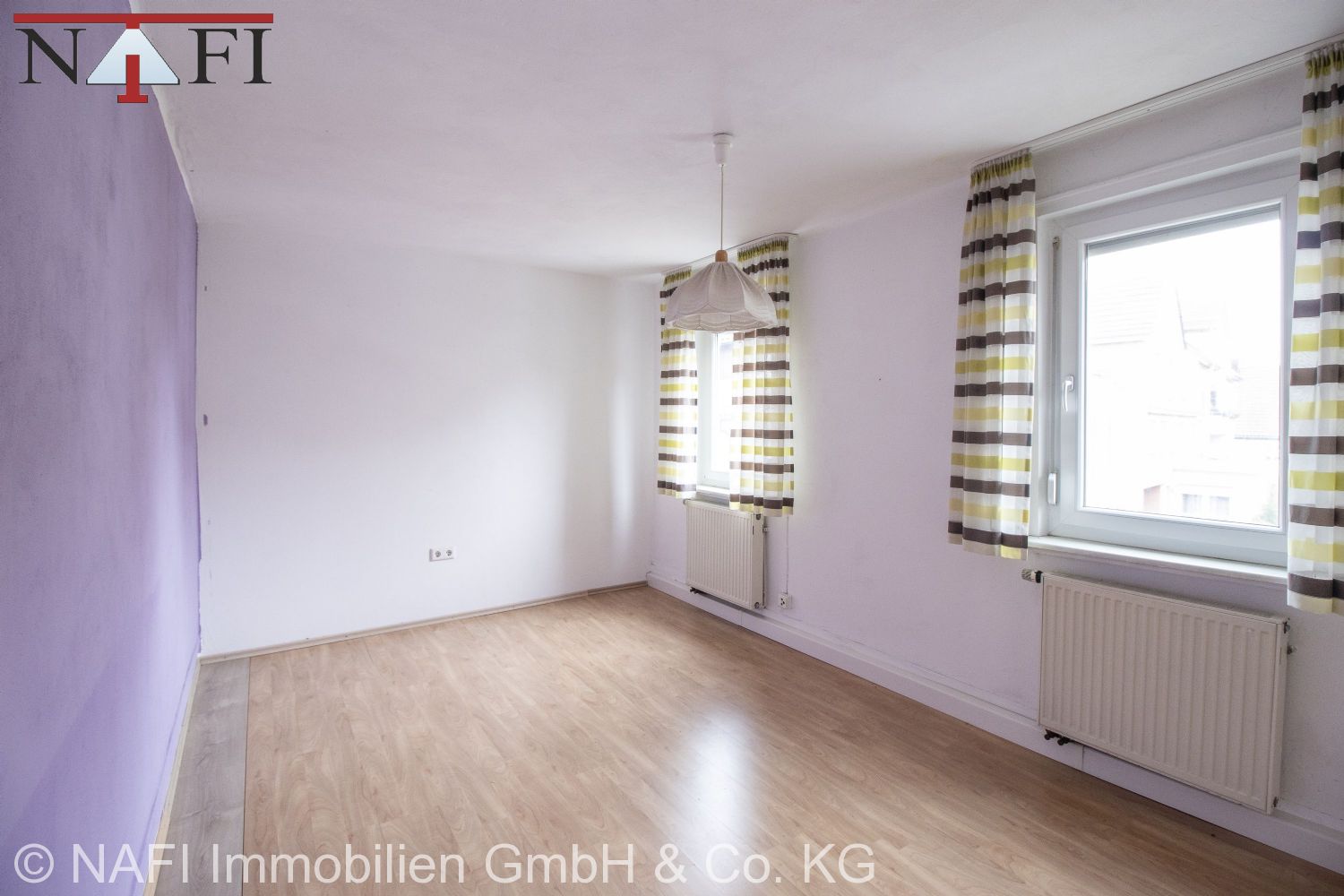 10% Renditestarkes Wohn- und Geschäftshaus in zentraler Ortskernlage mit Entwicklungspotenzial - 1. Zimmer (2-Zimmer-Whg. 1. OG) (21659)