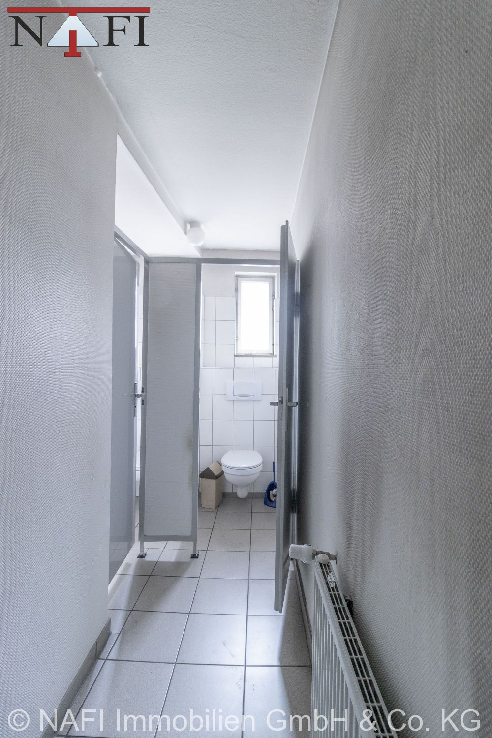 10% Renditestarkes Wohn- und Geschäftshaus in zentraler Ortskernlage mit Entwicklungspotenzial - WC (1. OG) (21664)