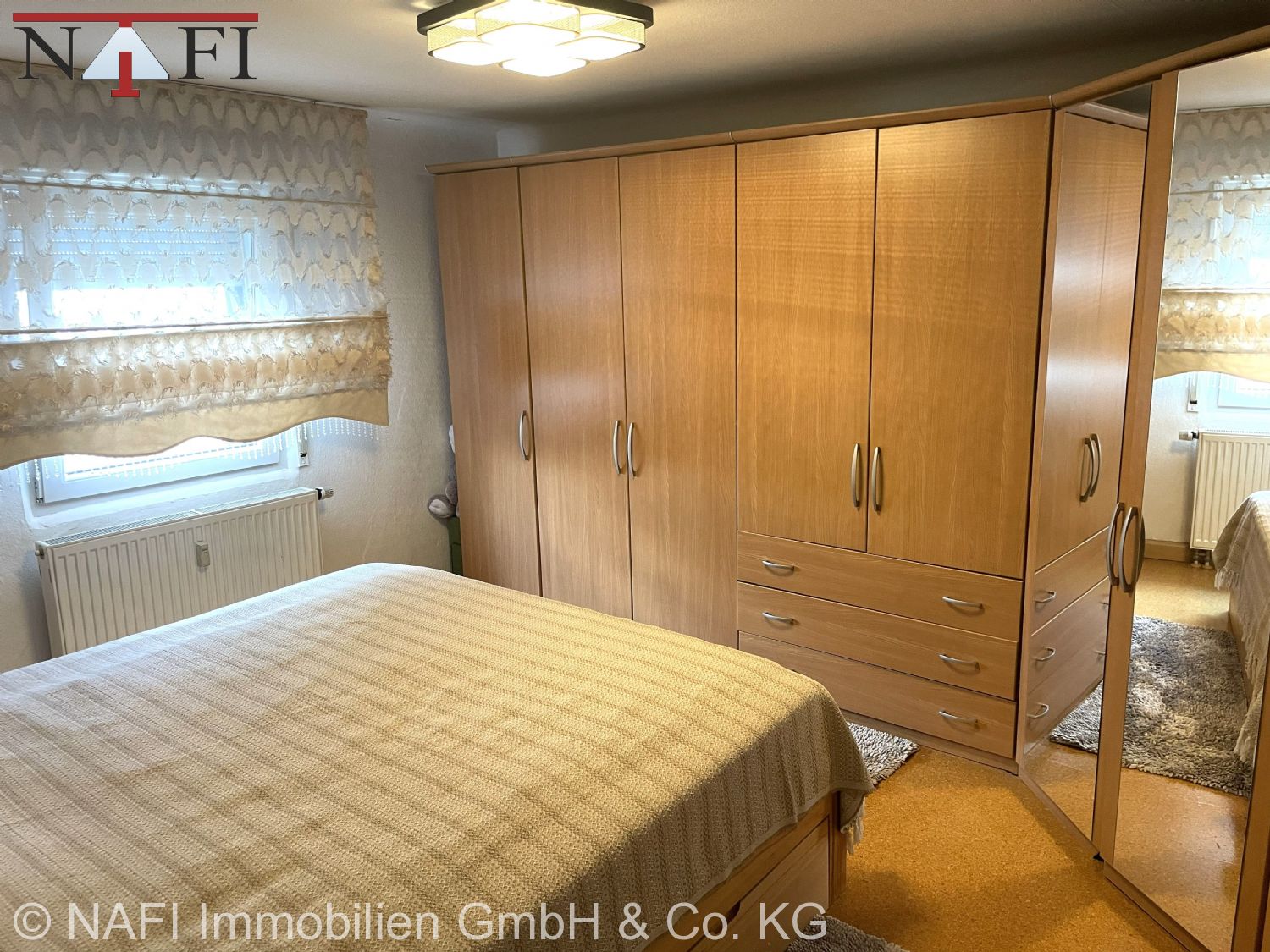 **Attraktives Mehrfamilienhaus in Großaspach mit vielseitigem Nutzungspotenzial** - Schlafzimmer (25985)