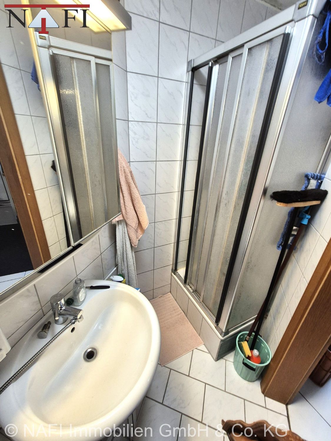 **Langfristig investieren: Gepflegte Eigentumswohnung** - Badezimmer (23713)