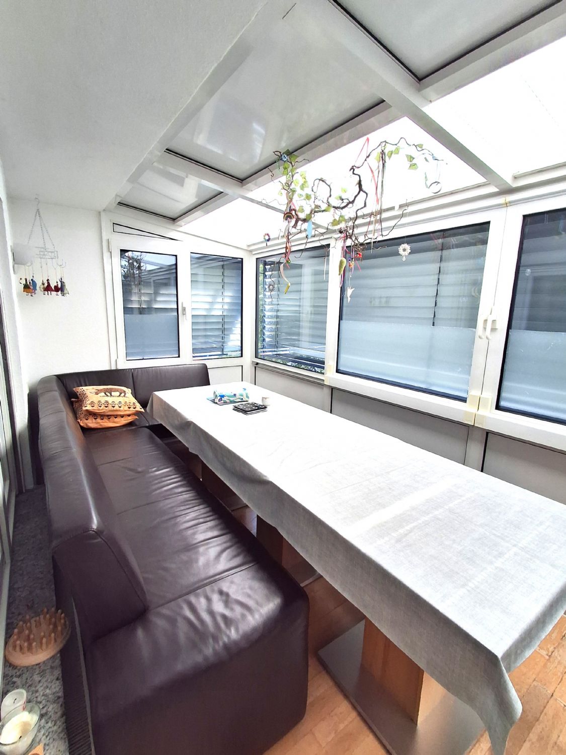Moderne 4-Zimmer-Maisonettewohnung mit Wintergarten und zwei Tiefgaragenstellplätzen - Wintergarten 1. Ebne (24470)