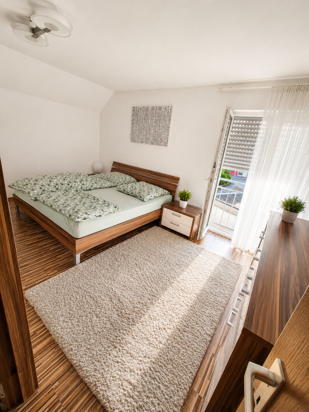 Moderne 4-Zimmer-Maisonettewohnung mit Wintergarten und zwei Tiefgaragenstellplätzen - Schlafzimmer 1. Ebene (24469)