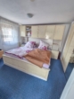 Schlafzimmer 1 OG links - Renditepotenzial 10% – Wohn- und Geschäftshaus mit Potenzial in zentraler Lager