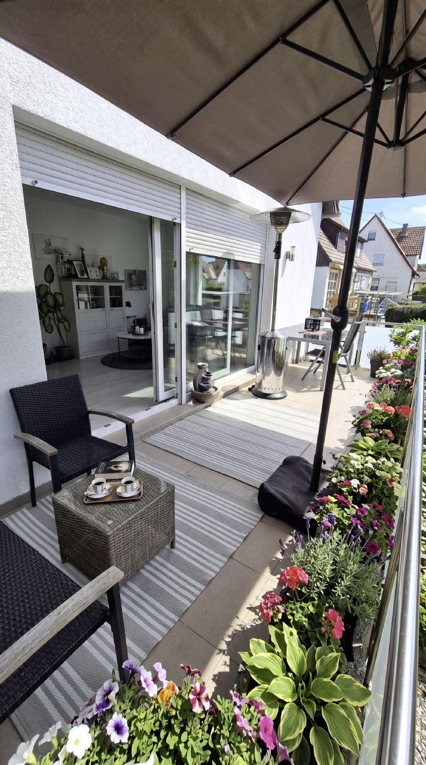 Familientraum mit Zukunft: Modernisiertes Einfamilienhaus mit Einliegerwohnung und Sonnengarten - Balkon EG (21036)