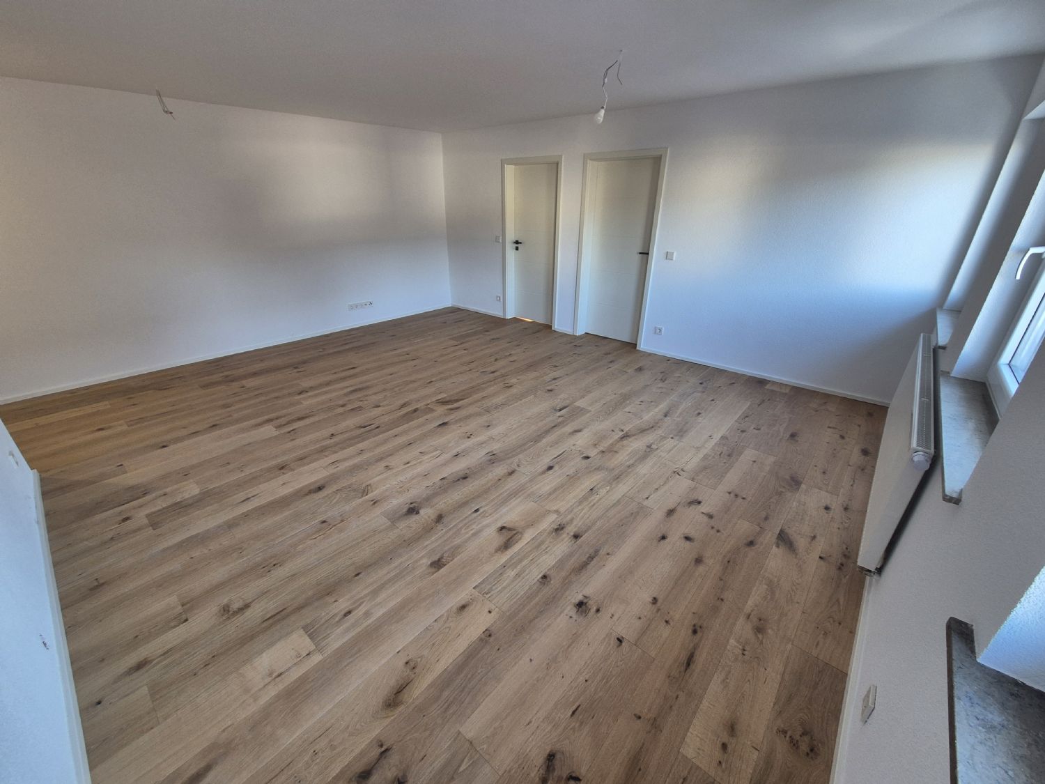Attraktive 3-Zimmer-Wohnung mit Balkon und Stellplatz – solide Kapitalanlage mit Perspektive - Wohnzimmer Beispiel (24654)