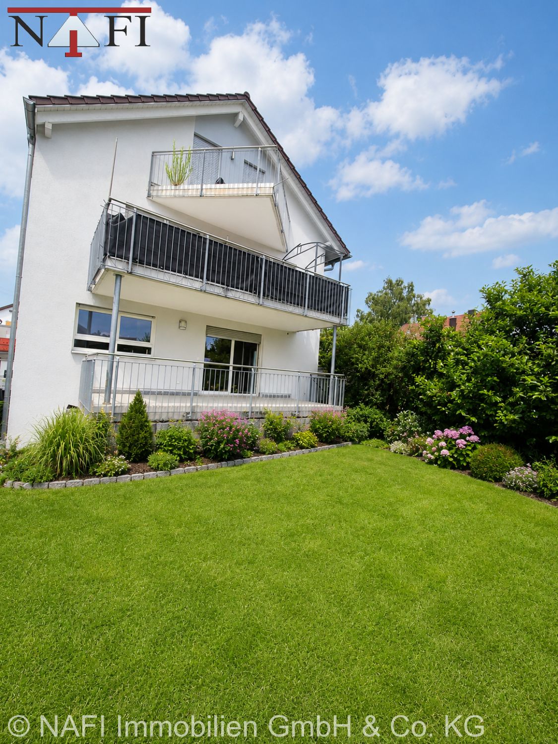 *Familienfreundlich wohnen – Moderne 4,5-Zi.-EG-Wohnung mit Garten* - Gartenansicht Süd-Ost (24958)