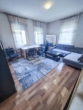 Wohnzimmer - Weinbergblick inklusive: 3-Zimmer-Wohnung mit viel Potenzial zur Modernisierung