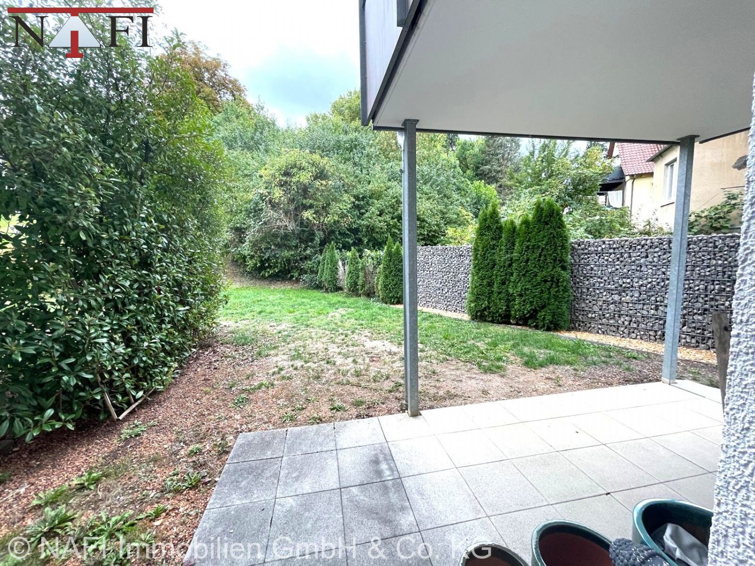 **Exklusive 4-Zimmer-Erdgeschosswohnung mit Garten, Terrasse & TG-Stellplatz in zentraler Lage** - Terrasse (27048)