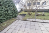teilüberdachte Terrasse - *Moderne und lichtdurchflutete 3,5-Zimmer-Erdgeschosswohnung mit Garten*