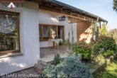 Hausansicht - **Wohnen am Ortsrand – Einfamilienhaus mit viel Platz und Doppelgarage**