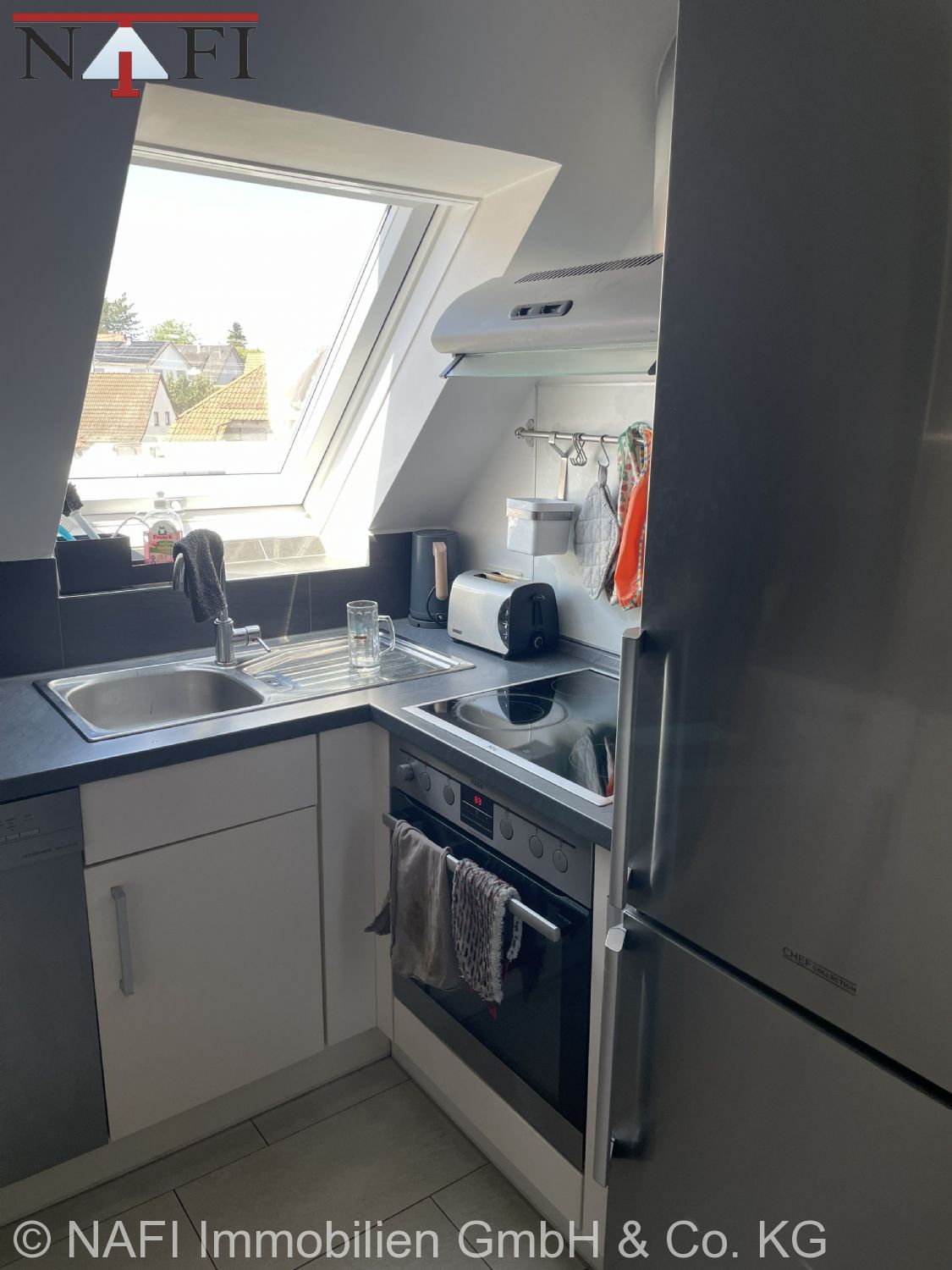 Moderne 4,5-Zimmer-Maisonettewohnung mit Weitblick, zwei Bädern und Tiefgarage - Küche 1. Ebene (21818)